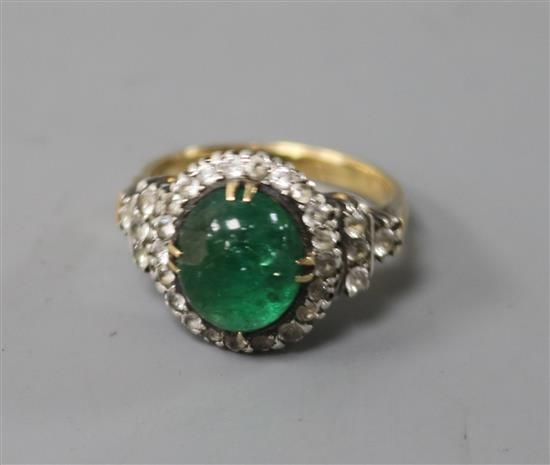 A yellow metal, cabochon emerald and white sapphire? cluster ring, size K.